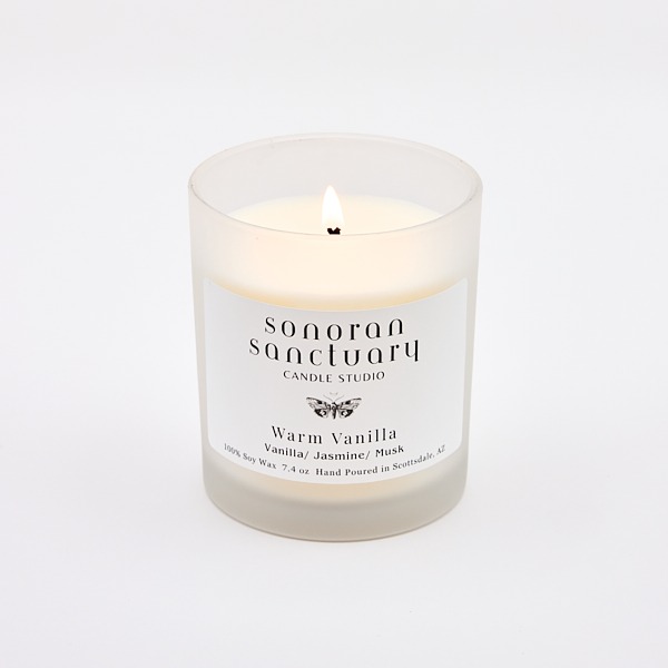 Warm Vanilla Tumbler Candle with lit wick