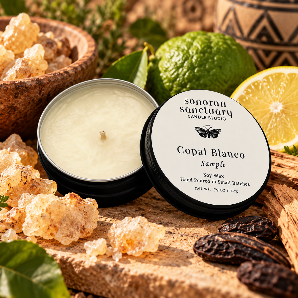 Sonoran Sanctuary Copal Blanco soy candle sample tin with branded lid, styled with bergamot, lemon, golden copal resin and natural botanicals