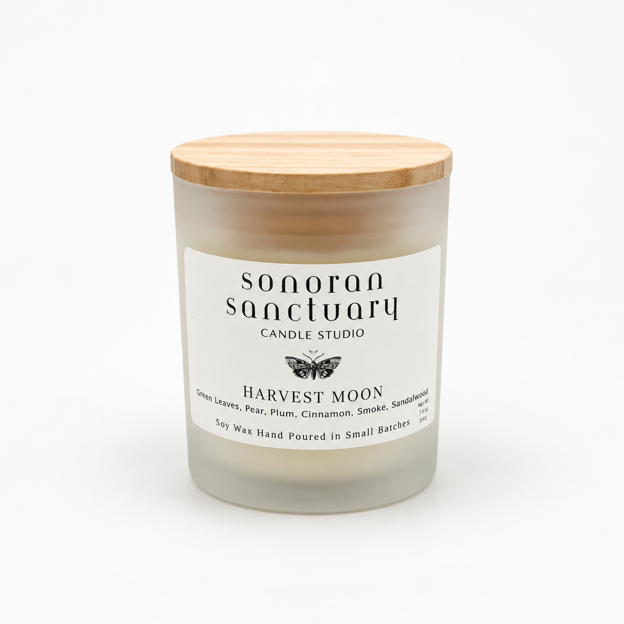 Harvest Moon 7.4 oz single-wick soy candle with lid in frosted faded glass