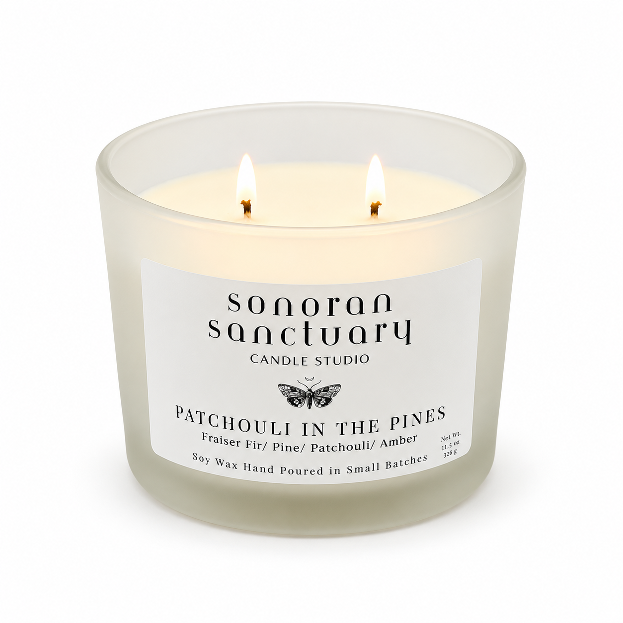 Patchouli in the Pines 11.5 oz double-wick soy candle in a frosted glass tumbler by Sonoran Sanctuary